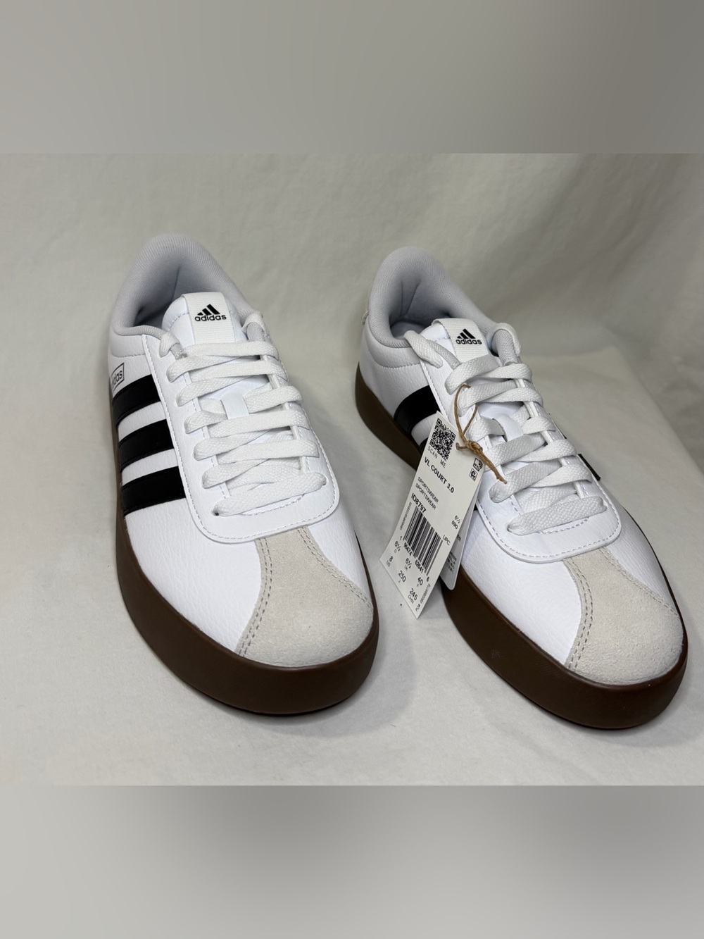 Adidas White Sneakers with Black Stripes and Brown Sole